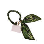 TWISTED PHONE/ PURSE ACCESSORY - GREEN 